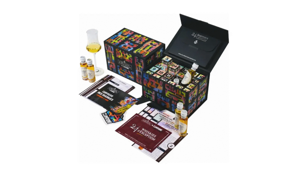 Coffret calendrier de l'Avent Le Club des Connaisseurs illustré par Cumbone, avec ses fioles de spiritueux